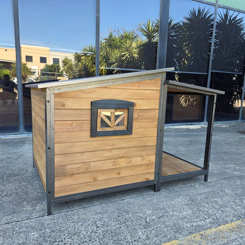 Wooden dog house with metal roof for labrador